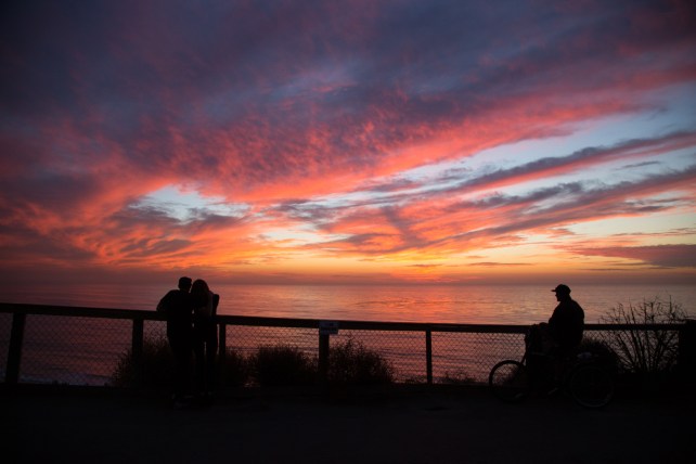 nick-abrams-couple-and-lone-man-at-sunset